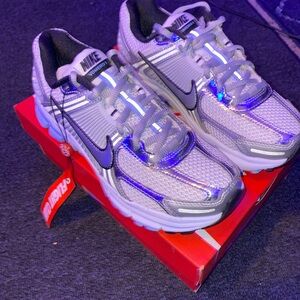 The Nike Women's Air Zoom Vomero 5 'Metallic Silver Blue Tint'